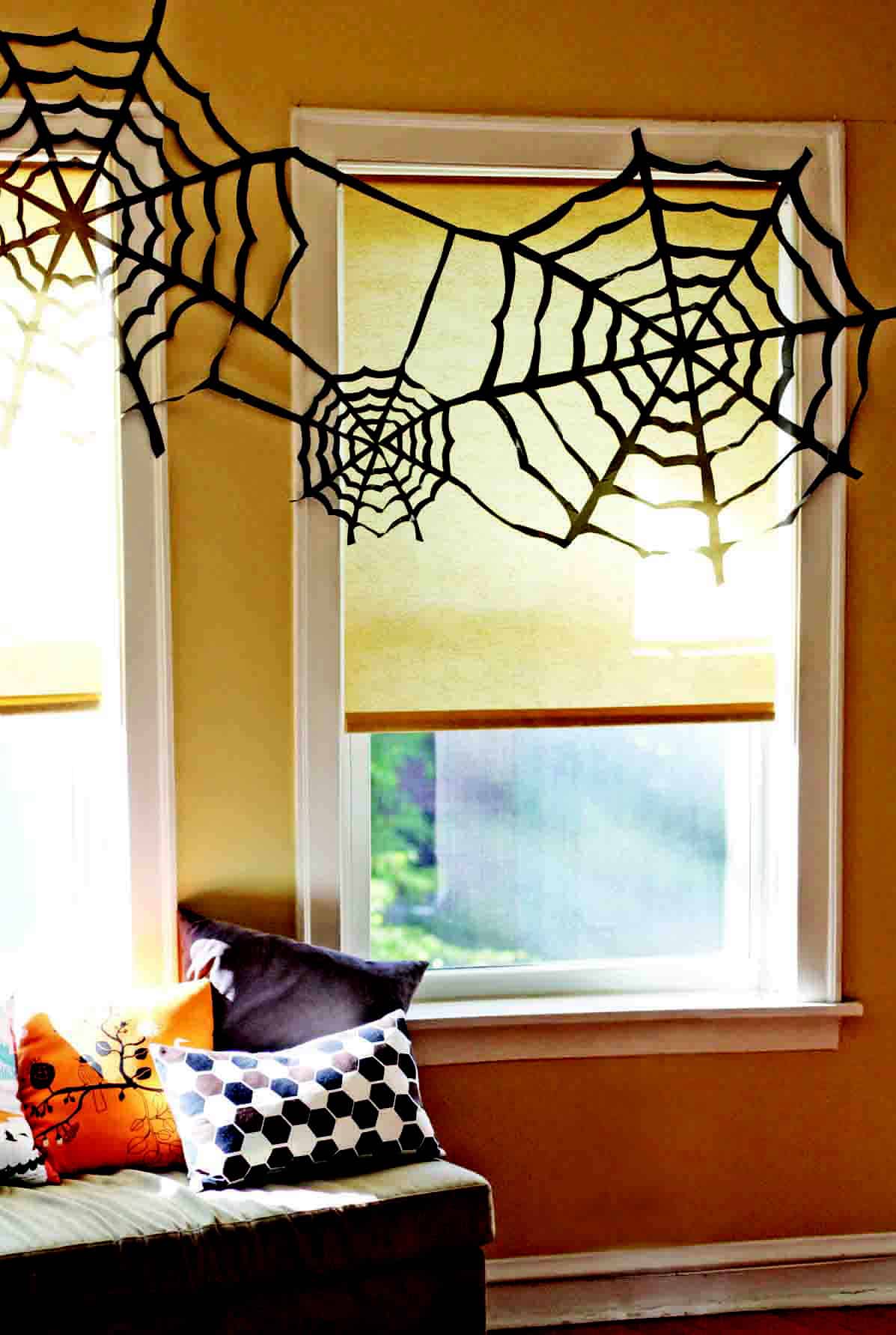 halloween26 - It's cheap and easy to turn a garbage bag into a spider web Halloween decoration. - Photo credit: Jessica Jones (can also be used on wire)