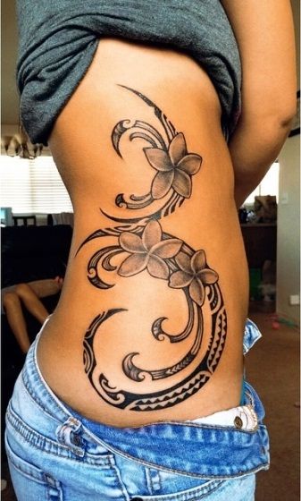 tatuagem feminina tribal costas barriga