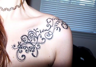 tatuagem feminina tribal delicada ombro